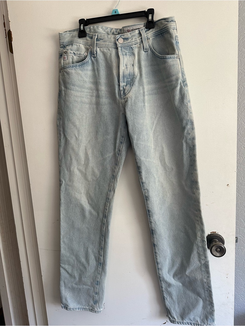 AG Light Wash women’s relaxed, high waisted, tapered Jeans
